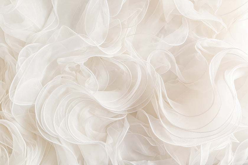 Image of Lace Rouge Fabric Representing Soft, Light and Gentle Skincare