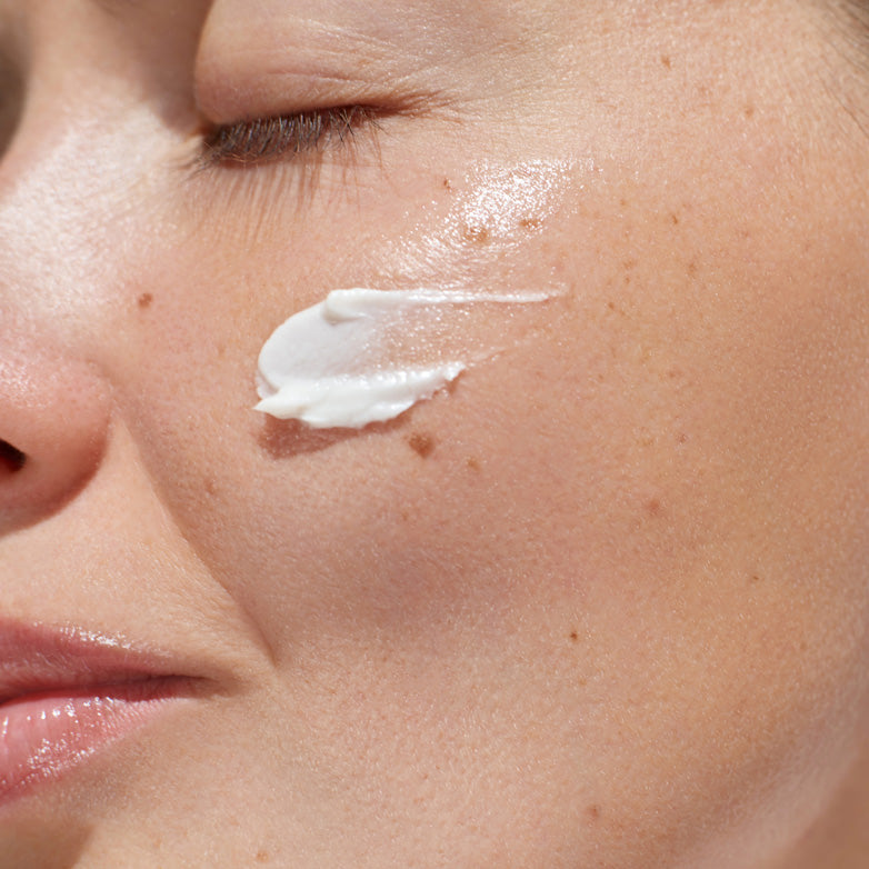 Woman with Cream Smear on Face