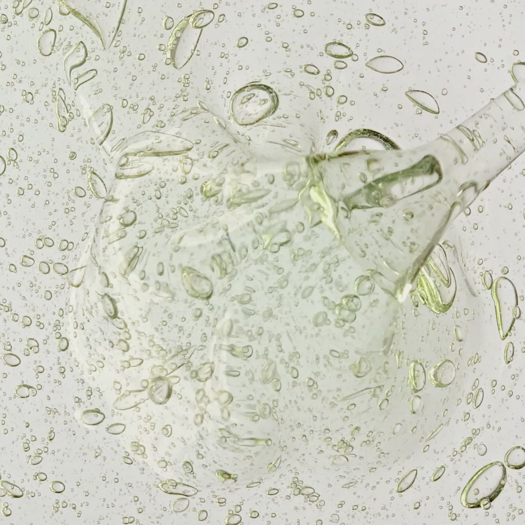 Video depicts the texture of the AHA Green Envy Serum